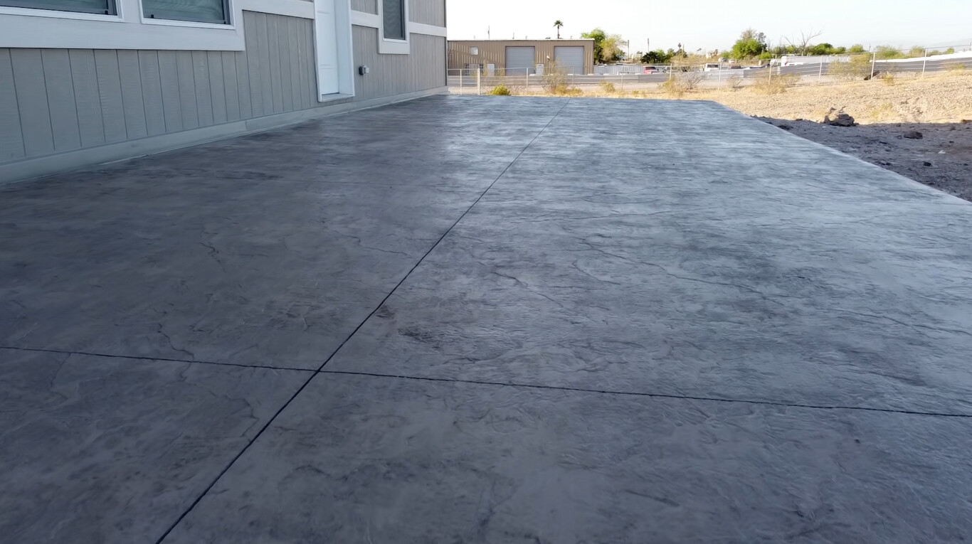 Large concrete patio installation in Pomona, CA showing professional finish